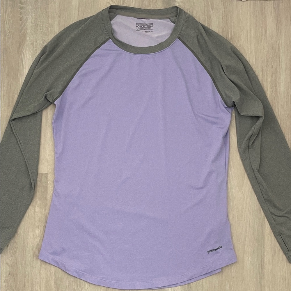 Patagonia women’s purple and gray long sleeve dry fit shirt with side pocket